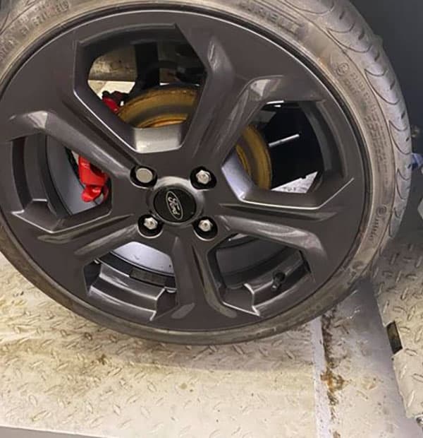 Refurbished alloy wheel fitted back to the car