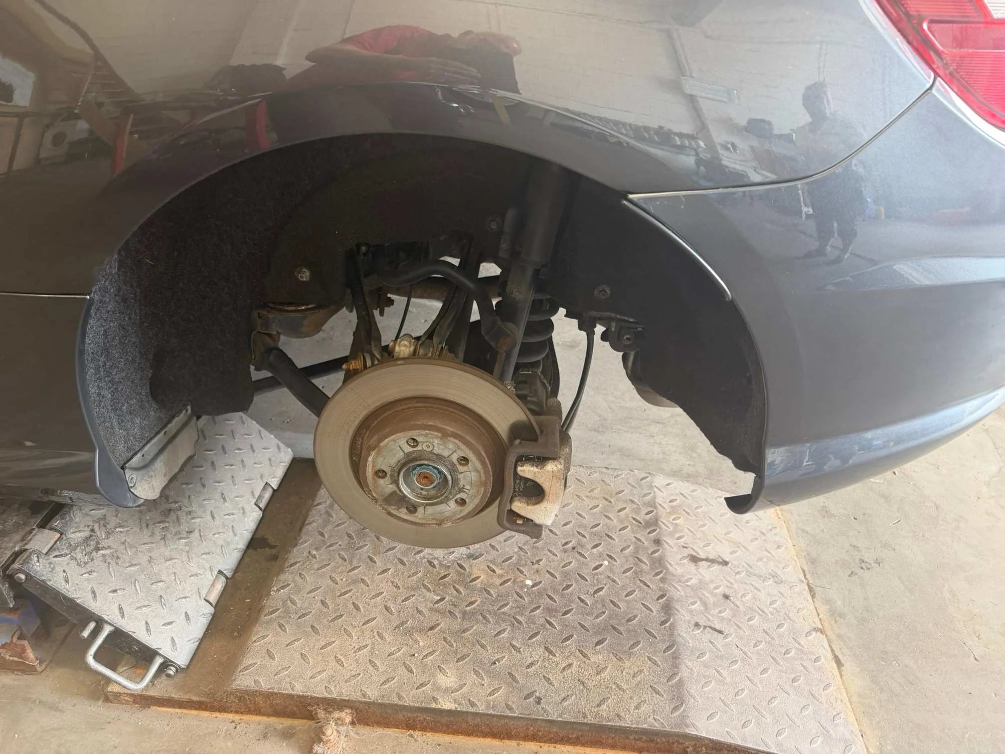 Dry ice blasting a wheel arch and suspension at The Valet Man