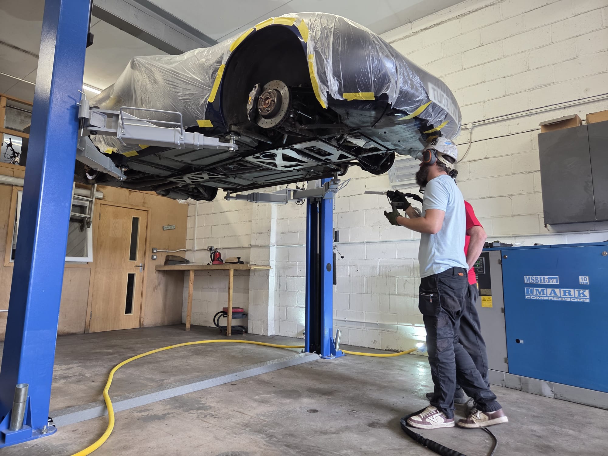 Dry ice cleaning a car underside at The Valet Man